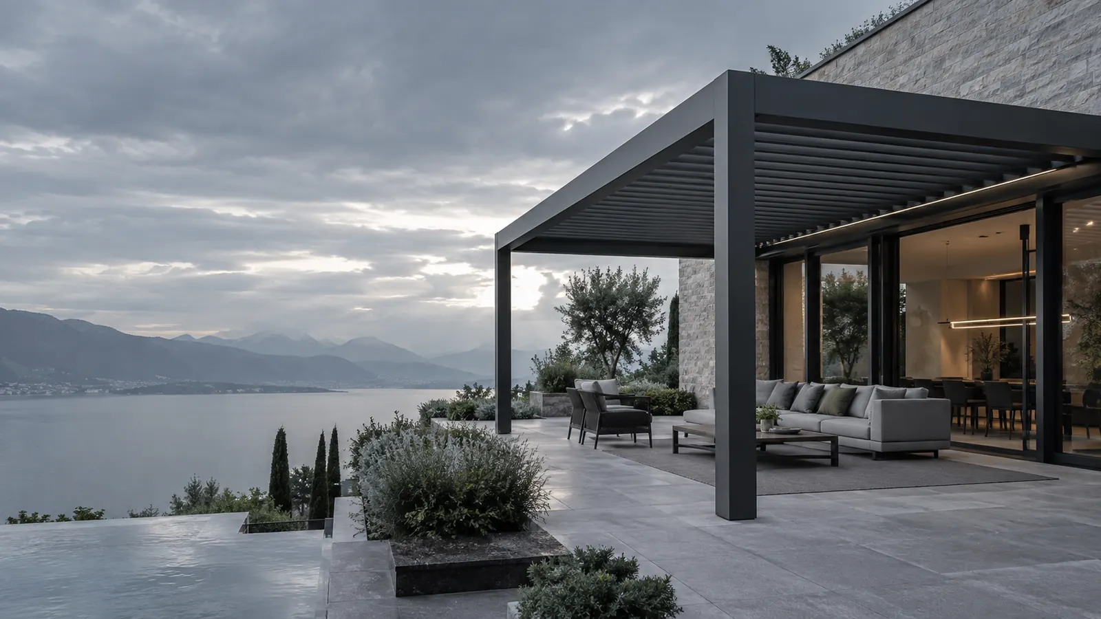 Charcoal motorized louvered pergola on a modern villa terrace
